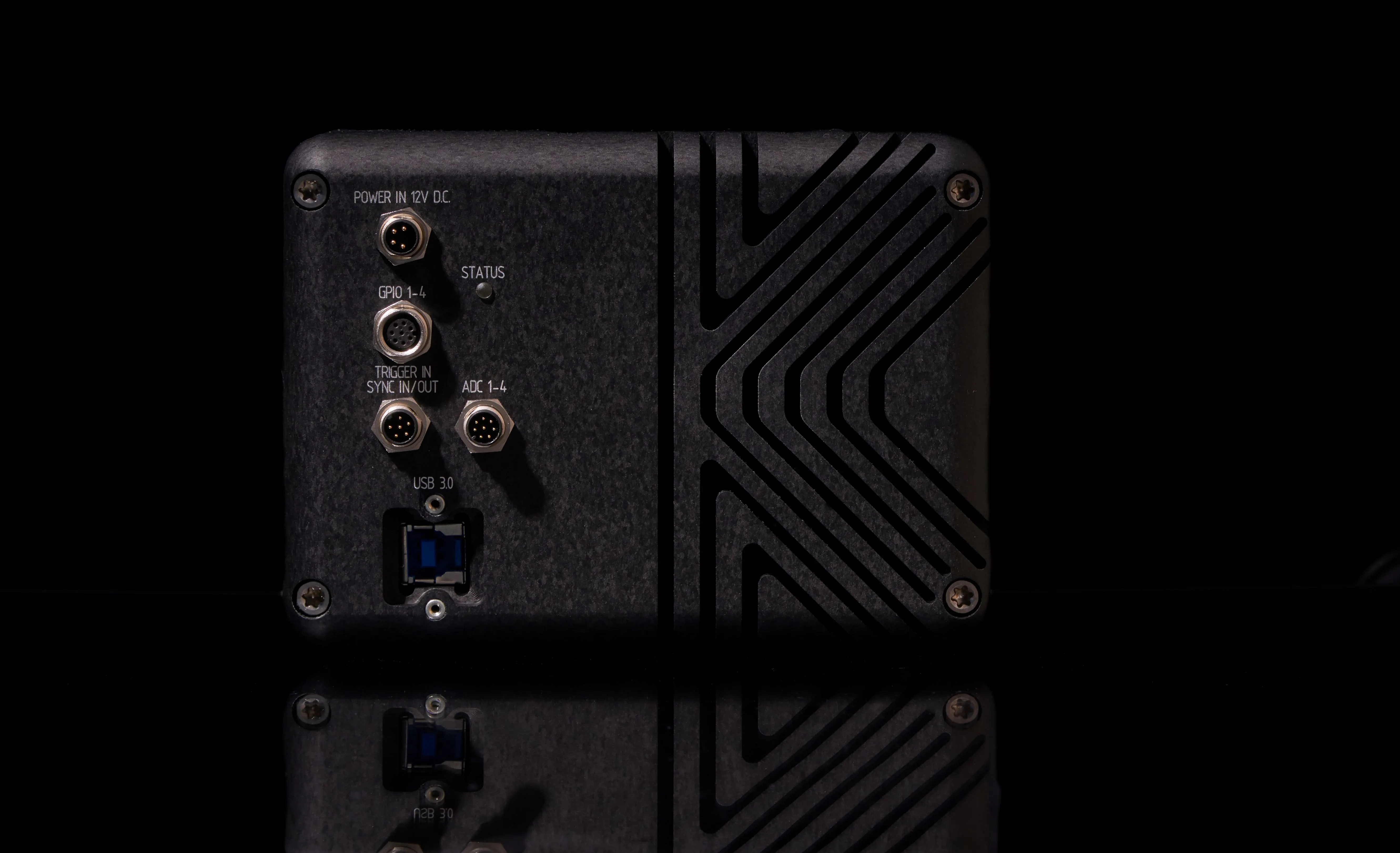 Rear panel of an HSCAM STREAMER camera, showing power, GPIO, trigger/sync and ADC connectors and the USB3.0 port, studio photograph.